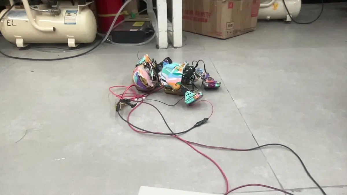 Huebot standing on the workshop floor
